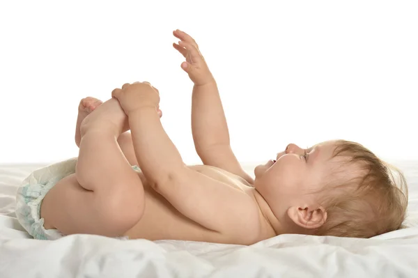 Bebé niña acostada en los mimos —  Fotos de Stock