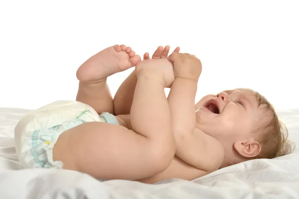 Bebé niña acostada en los mimos —  Fotos de Stock