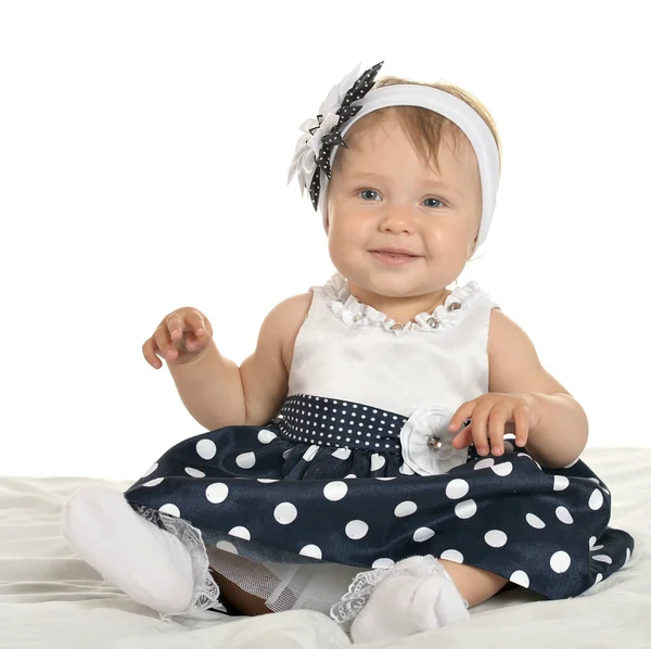 Bebê bonito em vestido bonito — Fotografia de Stock