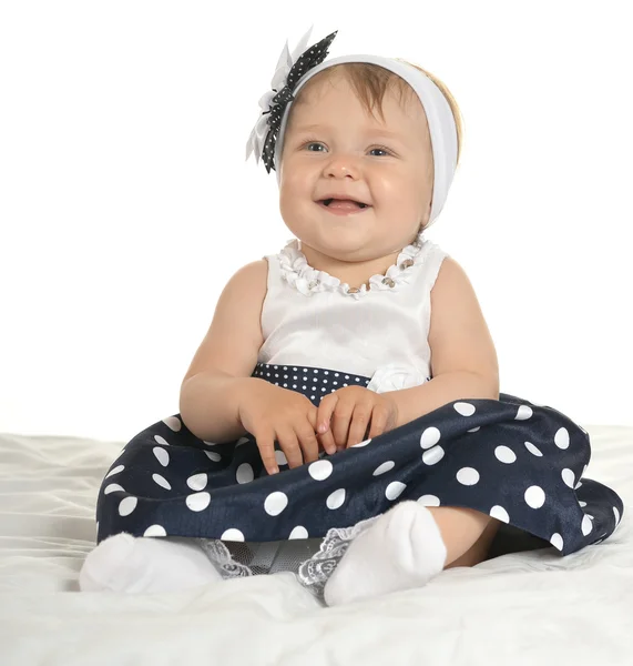 Bebê bonito em vestido bonito — Fotografia de Stock