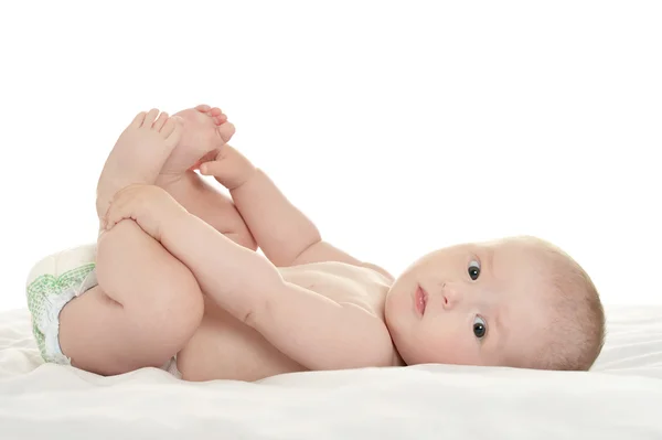 Baby flicka liggande på filt — Stockfoto