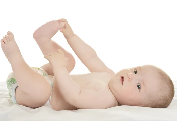 Meisje van de baby liggend op deken — Stockfoto