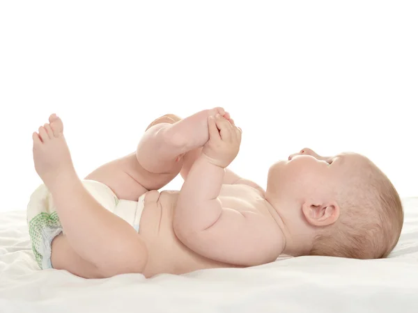 Bébé fille couché sur couverture — Photo