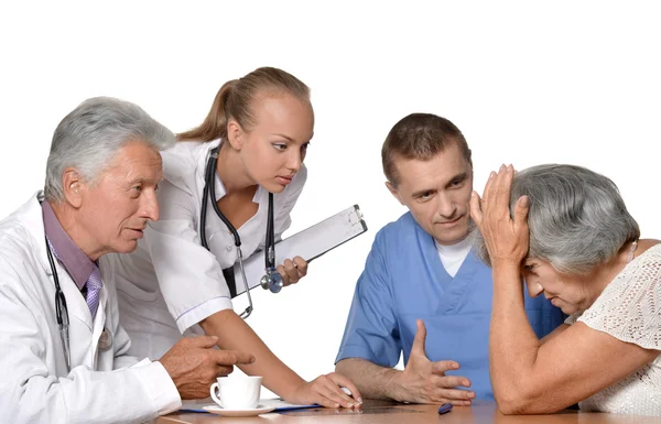 Old woman visitting  doctors — Stock Photo, Image