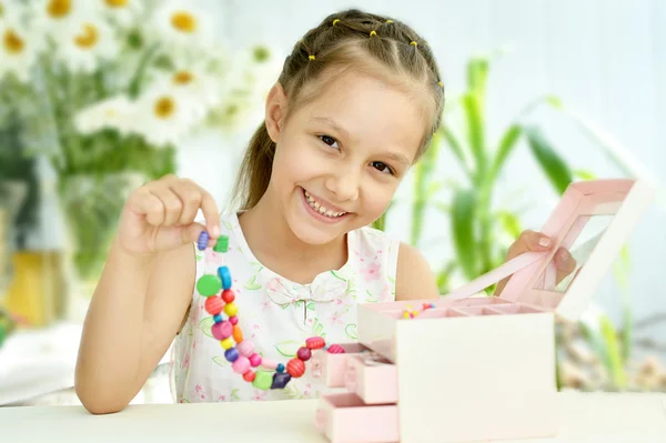 Cute Little girl with beads — Stock Photo, Image
