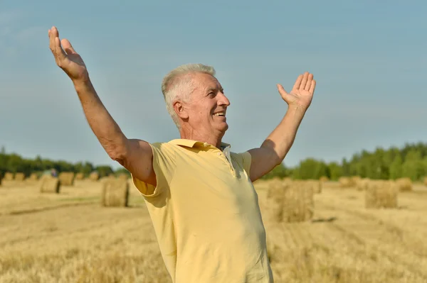 Mature man enjoying on nature — Stock Photo, Image