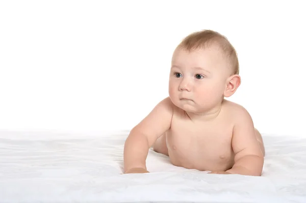 Adorable bébé garçon sur couverture — Photo