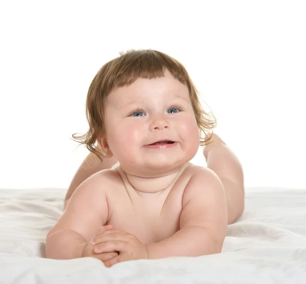 Schattige babymeisje op deken — Stockfoto