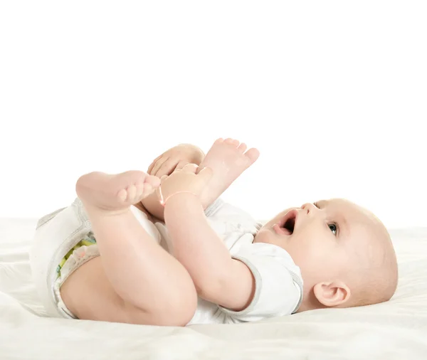 Entzückender kleiner Junge auf Decke — Stockfoto