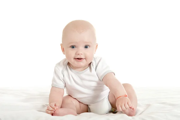 Adorable bébé garçon sur couverture — Photo