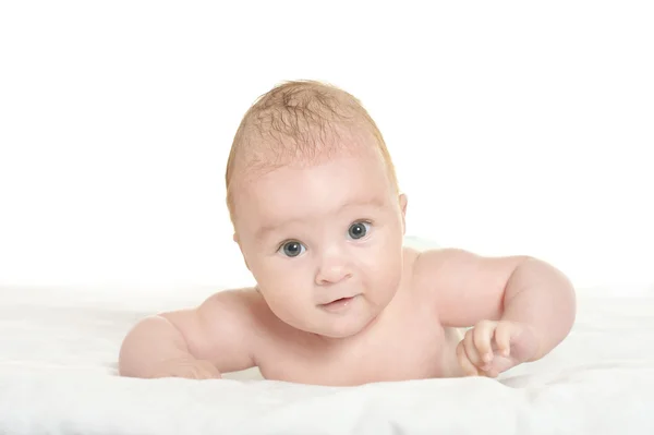 Schattige babymeisje op deken — Stockfoto