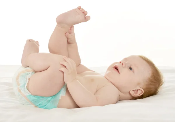 Adorable bebé niño en mimos — Foto de Stock