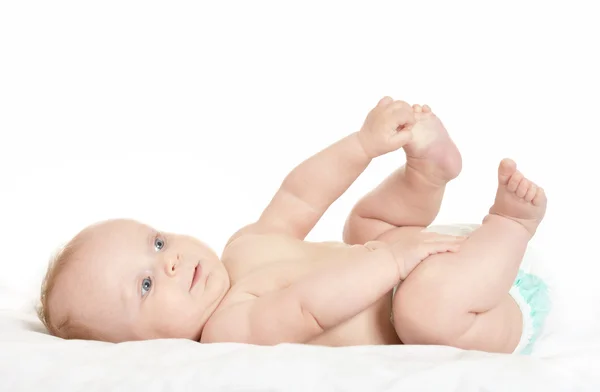 Entzückendes Baby Mädchen auf Decke — Stockfoto