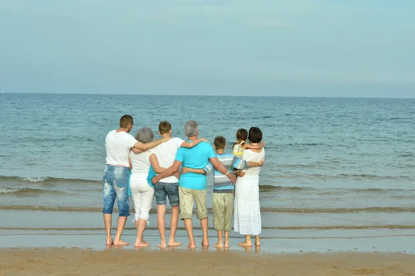 Happy family at beach — Stock Photo, Image