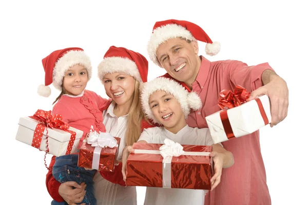 Família com crianças em chapéus de santa — Fotografia de Stock