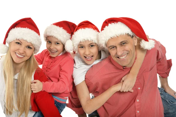 Família usando tampas de Natal férias — Fotografia de Stock