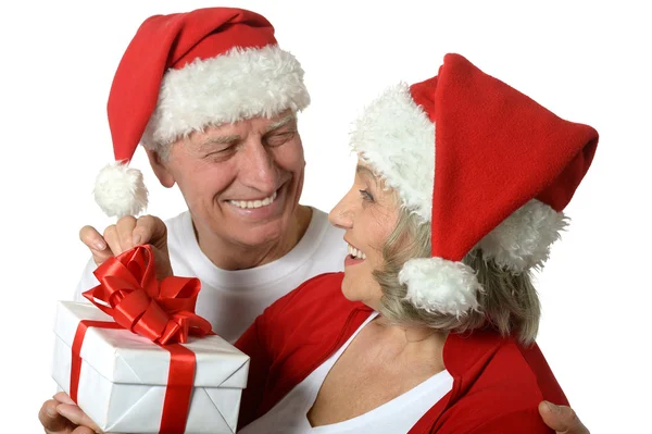 Amusing old couple  with gift — Stock Photo, Image