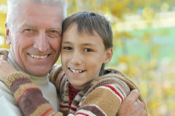 Grandfather and grandson in park — Stock Photo, Image