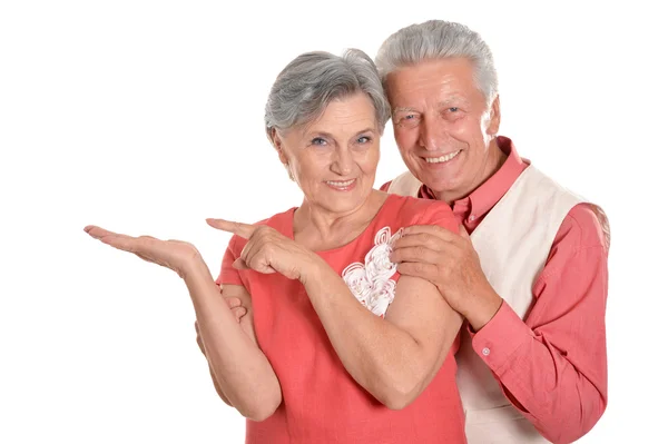 Elderly couple pointing — Stock Photo, Image