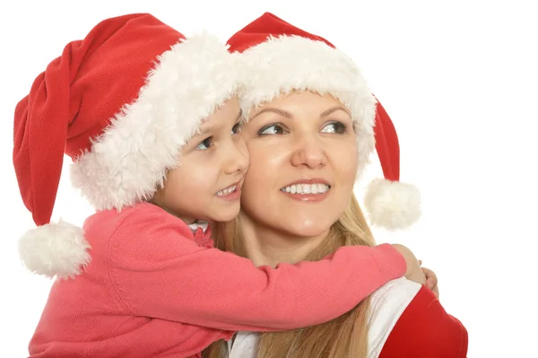 母亲带着女儿戴着圣诞帽 — 图库照片