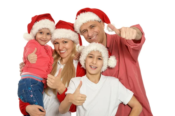 Famiglia indossa cappelli natalizi — Foto Stock