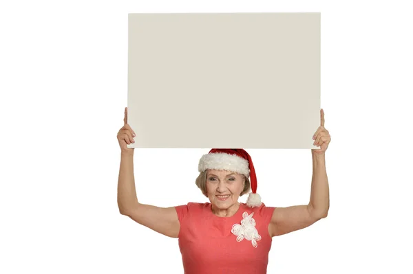 Senior woman  holding white blank — Stock Photo, Image