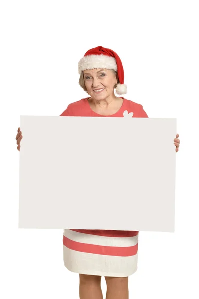 Senior woman  holding white blank — Stock Photo, Image