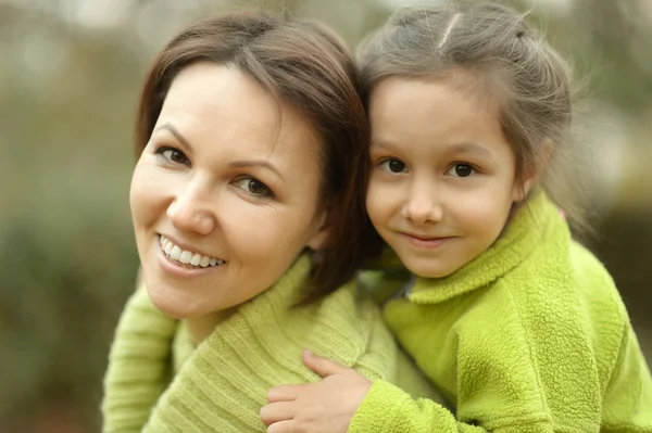 Mother with daughter  in autumn park Royalty Free Stock Images