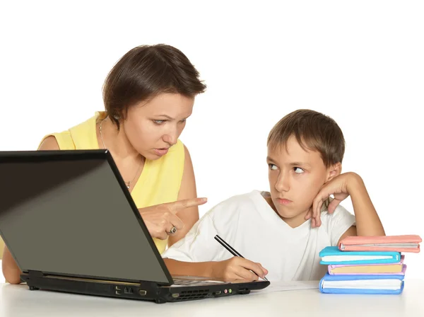 Madre e hijo haciendo la tarea —  Fotos de Stock