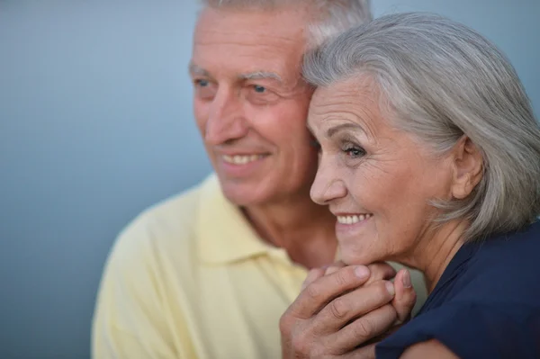 Elderly couple  on the background of sky — Stock Photo, Image