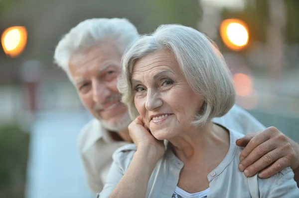 Mature couple on  in summer park — Stock Photo, Image