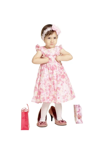 Niña en vestido y zapatos grandes — Foto de Stock