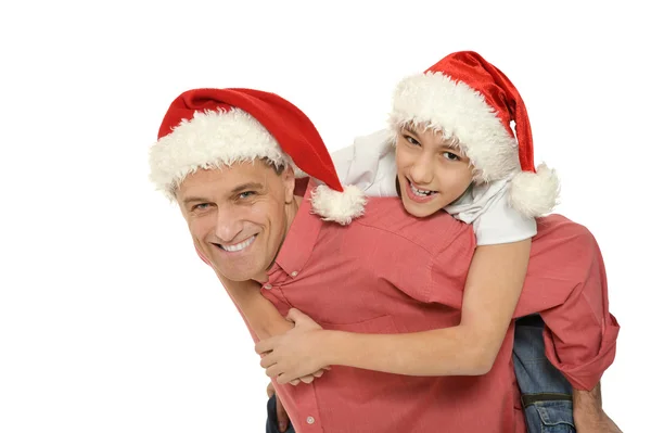 Babam Noel kapaklar giyen oğlu ile — Stok fotoğraf