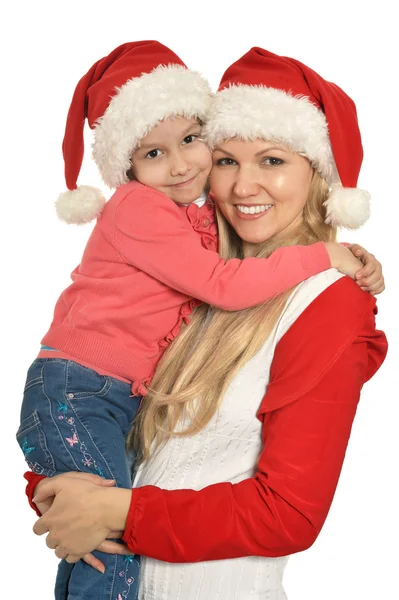 Mãe com filha usando bonés de Natal — Fotografia de Stock