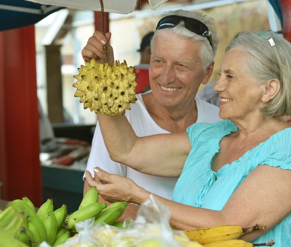 Beautiful elderly couple in  market — Stock Photo, Image