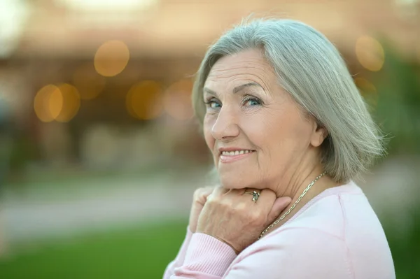 Senior woman in summer park — Stock Photo, Image