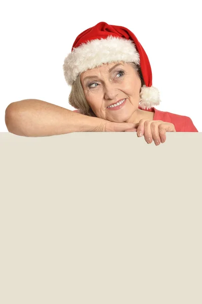 Senior woman  holding white blank — Stock Photo, Image