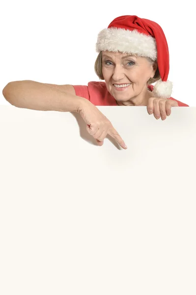 Senior woman  holding white blank — Stock Photo, Image