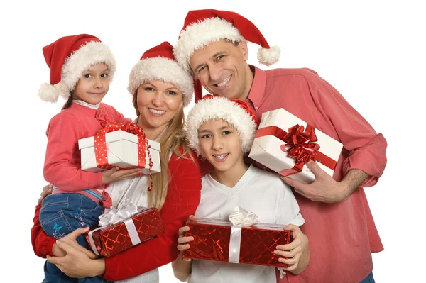 在圣诞老人的帽子小孩的家庭 — 图库照片
