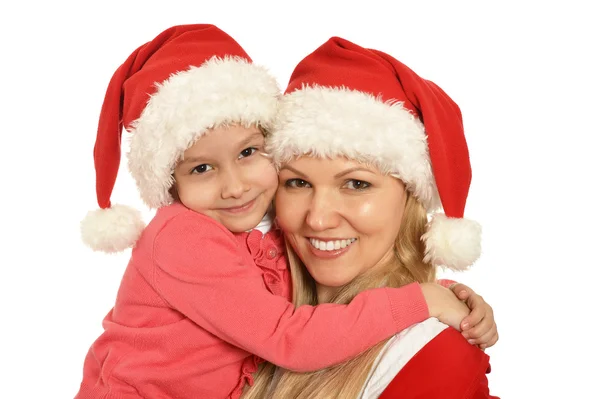 母亲带着女儿戴着圣诞帽 — 图库照片
