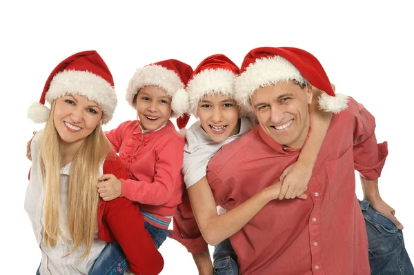 Famille avec enfants en chapeaux de Père Noël Images De Stock Libres De Droits