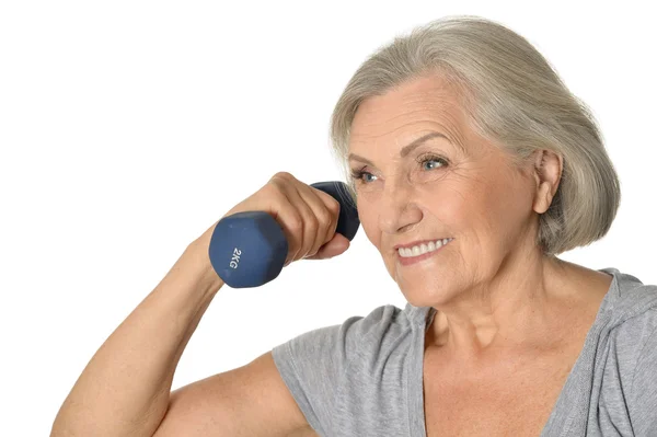 Mujer mayor haciendo ejercicio con mancuerna — Foto de Stock