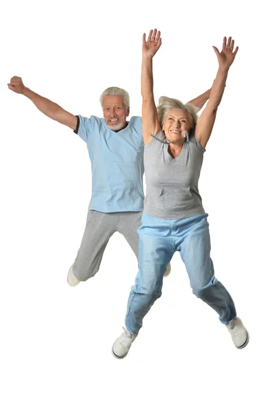 Senior couple jumping — Stock Photo, Image