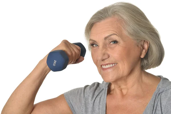 Senior woman exercising with dumbbell — Stock Photo, Image
