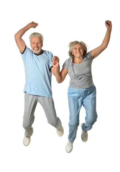 Senior pareja saltando — Foto de Stock