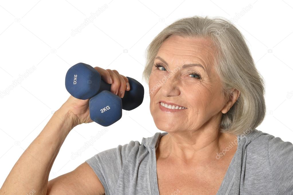 Mujer mayor haciendo ejercicio con pesas — Foto de stock #92662094