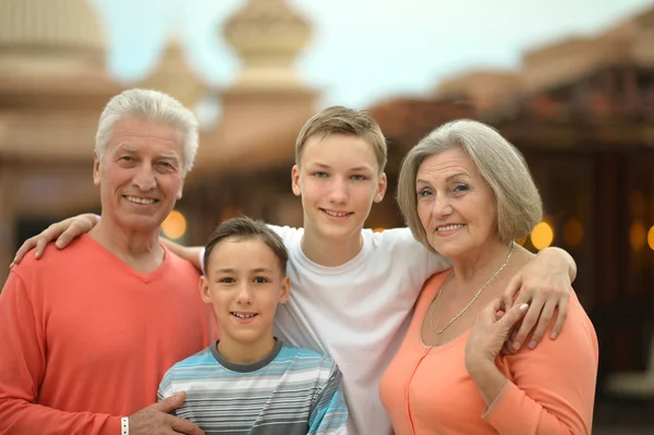 Happy family on tropical resort — Stock Photo, Image