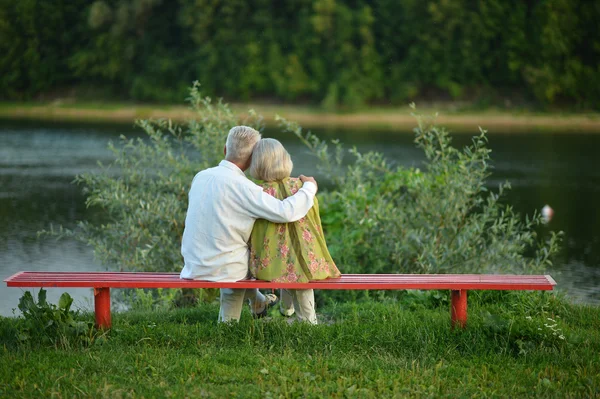 Senior couple resting at park — Stock Photo, Image