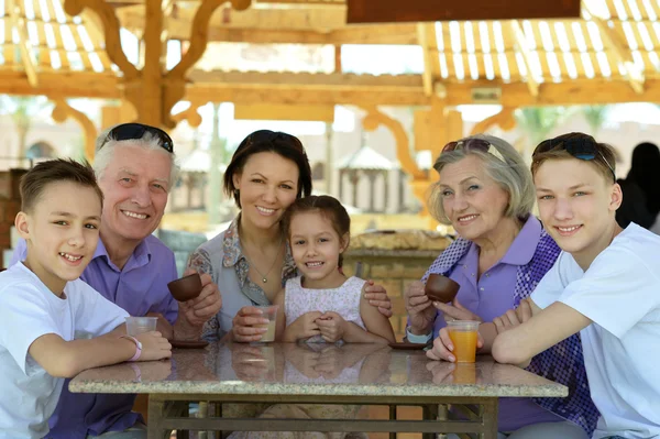 Happy family with coffee — Stock Photo, Image