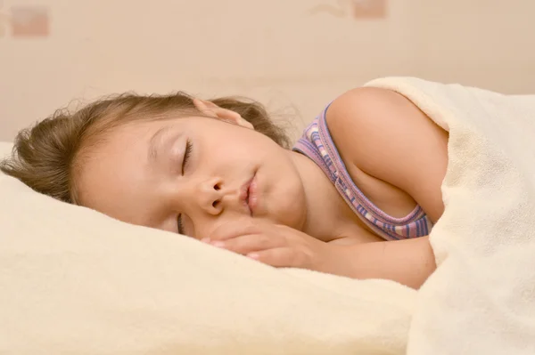Cute little girl śpi — Zdjęcie stockowe